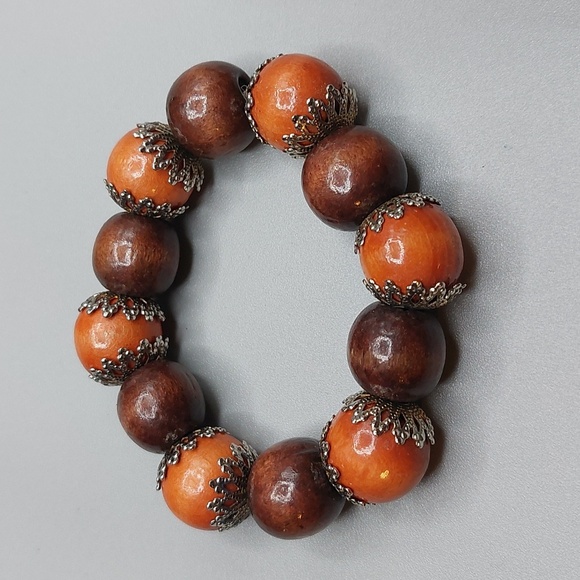 Jewelry - Brown Brownish Orange Beaded Bracelet Accented with Silver Filigree End Caps
